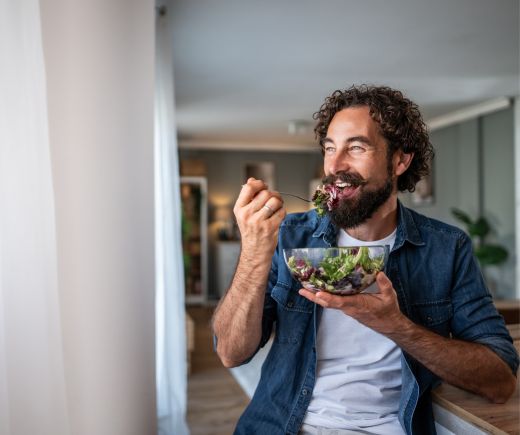 Man eating salad