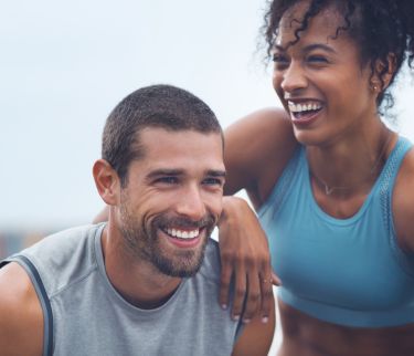 EXCERCISING HEALTHY MAN AND WOMAN