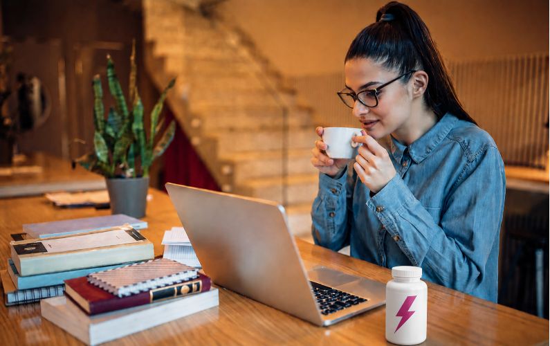 woman focused drinking coffee