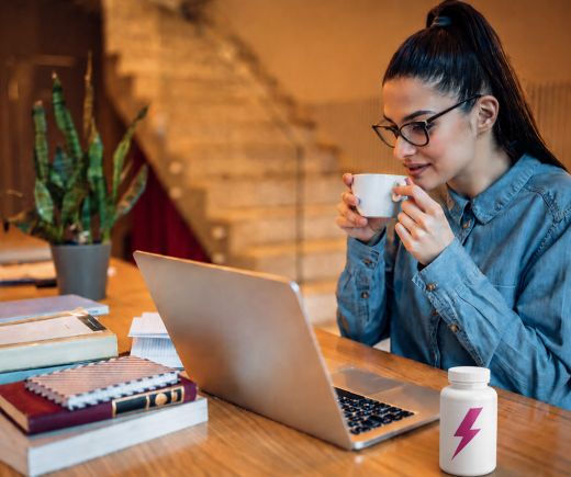 woman focused drinking coffee